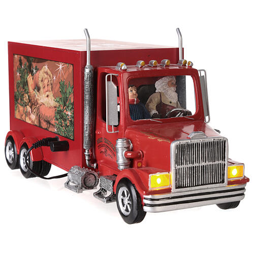 Escena navideña camión de Papá Noel 20x30x10 cm 10