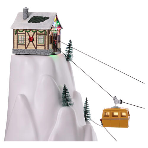 Pueblo navideño teleférico movimiento 140 cm 3