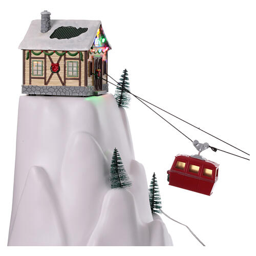 Pueblo navideño teleférico movimiento 140 cm 7