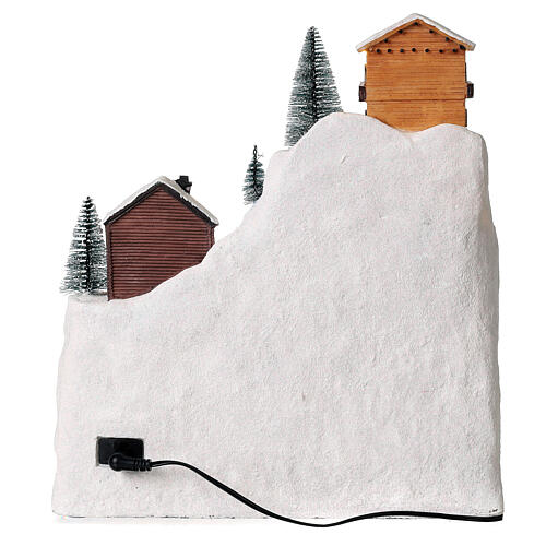 Christmas village set: skiers and river 14x12x8 in 6