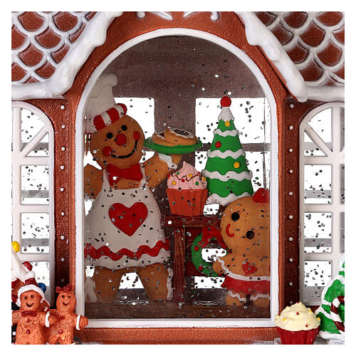 Gingerbread house snow globe lights and movement 25 cm 4