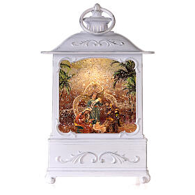 Nativity lantern snow globe white lights and movement 30 cm