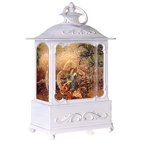 Nativity lantern snow globe white lights and movement 30 cm 5