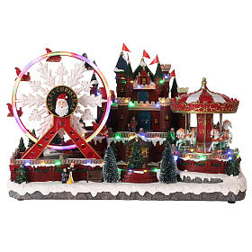 Village de Noël roue panoramique et carrousel 50x30x35 cm