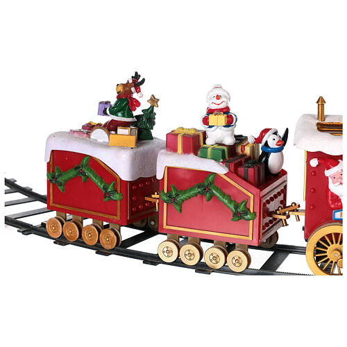 Zug mit Weihnachtsmann in Bewegung mit Lichtern, 50x15x35 12