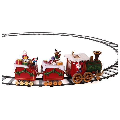 Zug mit Weihnachtsmann in Bewegung mit Lichtern, 50x15x35 15