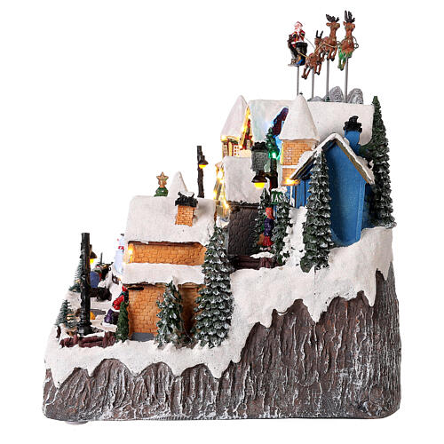 Weihnachtsdorf Weihnachtsmann auf Schlitten mit Rentier, 40x60x30 cm 8