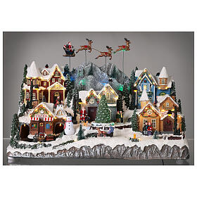 Christmas Village Santa Claus on sleigh and reindeer 40x60x30cm