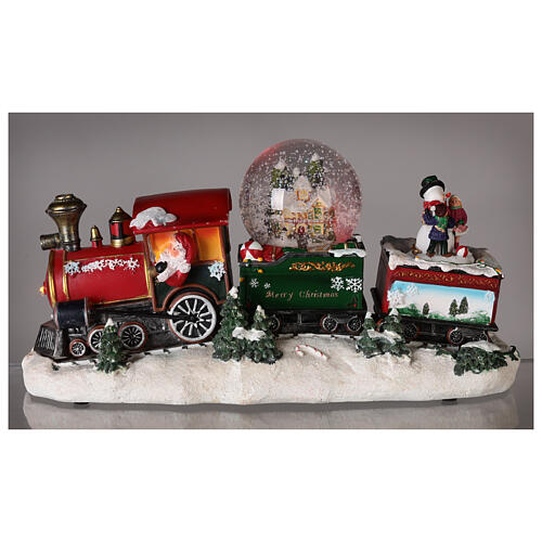 Petit train de Noël avec boule à neige, animation et lumières 20x35x10 cm 6