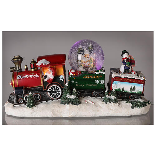 Petit train de Noël avec boule à neige, animation et lumières 20x35x10 cm 8