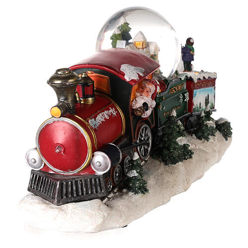 Petit train de Noël avec boule à neige, animation et lumières 20x35x10 cm 9