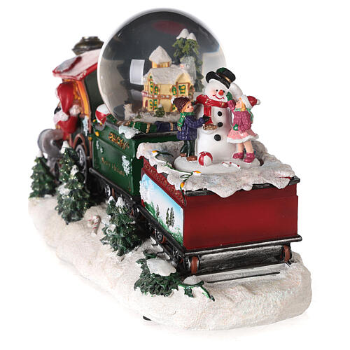 Petit train de Noël avec boule à neige, animation et lumières 20x35x10 cm 11
