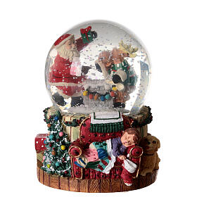 Boule à neige Père Noël et renne avec boîte à musique 15x10x10 cm