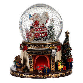 Schneekugel aus Glas mit Weihnachtsmann Feuer und Geschenken, 20x15x15 cm