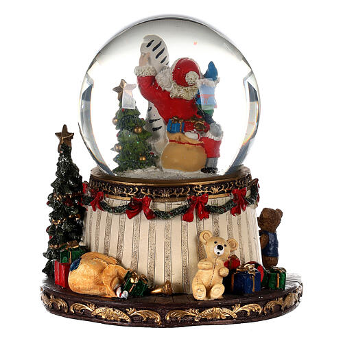 Esfera de vidrio nieve Papá Noel fuego regalos 20x15x15 cm 5