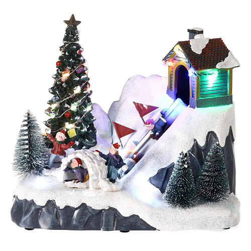 Ski slope scene with motion and multicoloured LED lights 6x8x6 in 1