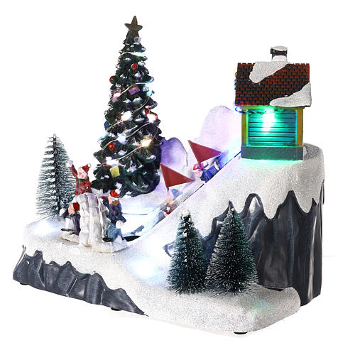 Ski slope scene with motion and multicoloured LED lights 6x8x6 in 3