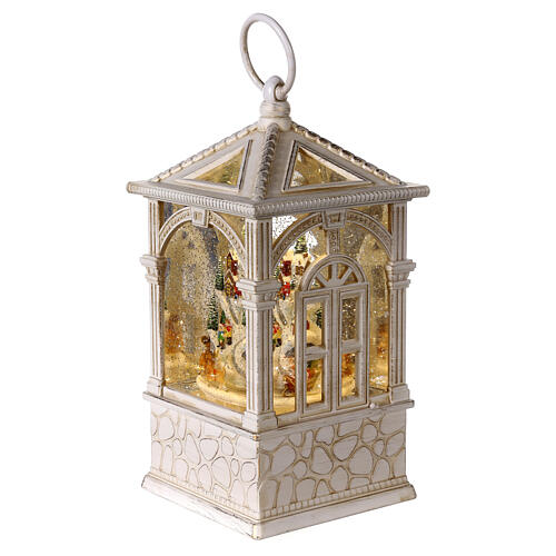 Lantern with snow and miniature village, LED lights and motion, 10x4x4 in 3