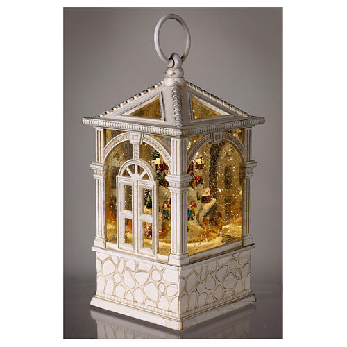 Lantern with snow and miniature village, LED lights and motion, 10x4x4 in 4