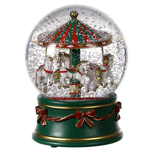 Snow globe with green carousel and white horses, snow and music box, 6x5 in 4
