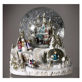 Snow globe with blue and red villa, double globe and sled, 6x6x6 in