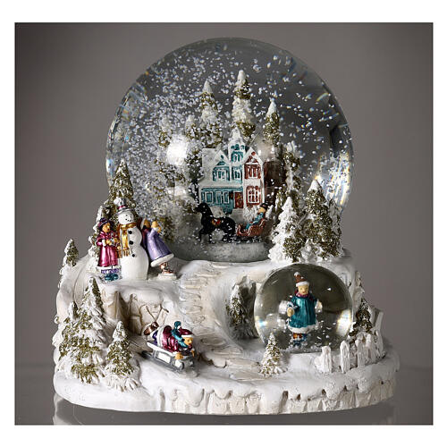 Snow globe with blue and red villa, double globe and sled, 6x6x6 in 2