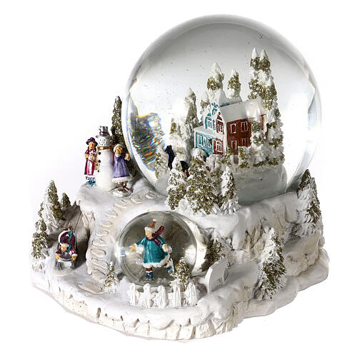 Snow globe with blue and red villa, double globe and sled, 6x6x6 in 3