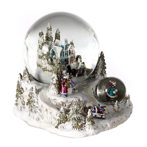 Snow globe with blue and red villa, double globe and sled, 6x6x6 in 4