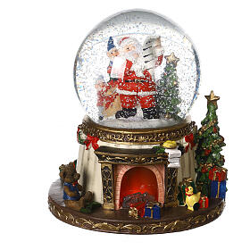 Snow globe with Santa Claus, snow and chimney with LED 20x15x15 cm