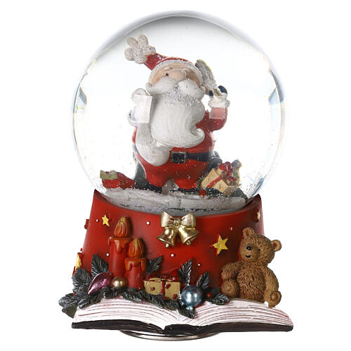 Snow globe with Santa Claus on an open book, music box, 15x10x10 cm 3