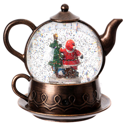 Snow globe, Santa Claus in a tea pot, 8x8x6 in 6