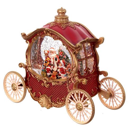 Carrozza palla di vetro con Babbo Natale 20x25x10 cm