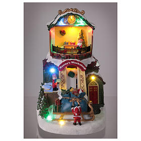 Winterszene, Spielzeugladen mit Bewegung, LED-Beleuchtung und Musik – 25×20×15 cm