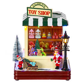 Weihnachtsspielzeugladen, Beleuchtung, Bewegung und Musik, 25x15x5 cm