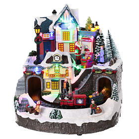 Christmas village set, toyshop with train in motion, 10x10x10 in