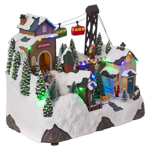 Ski Christmas Village with skiers and cable cars 25x30x20 cm 5