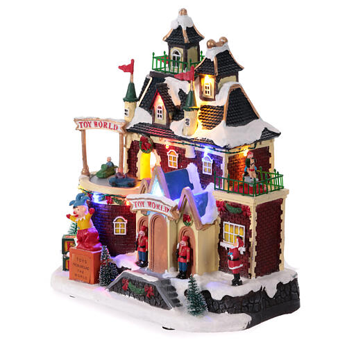 Christmas village set: toyshop with animated cars, 12x6x6 in 3