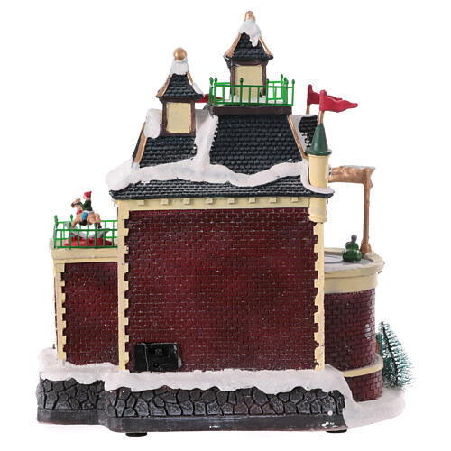 Christmas village set: toyshop with animated cars, 12x6x6 in 5