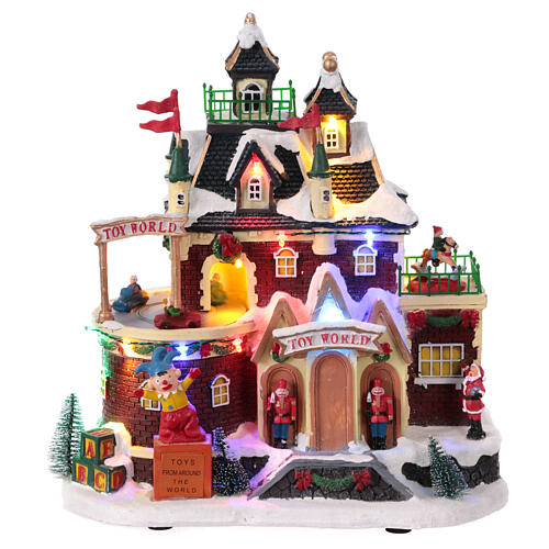 Christmas Village toy shop with moving cars 30x30x15 cm 1
