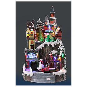 Christmas village set on two levels with train in motion, 14x8x8 in