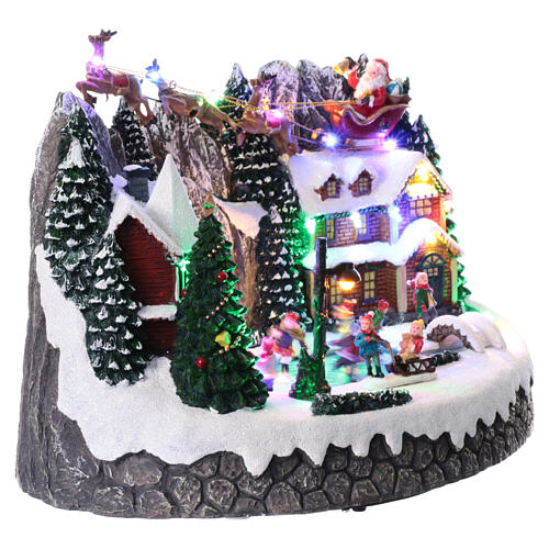 Villaggio di Natale con pista di pattinaggio e Babbo Natale 25x40x25 cm 5