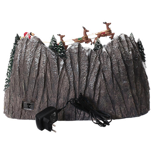 Villaggio di Natale con pista di pattinaggio e Babbo Natale 25x40x25 cm 6