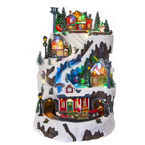 Christmas village set: mountain with train and ice skaters in motion, 18x12x14 in 1