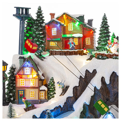 Christmas village set: mountain with train and ice skaters in motion, 18x12x14 in 5