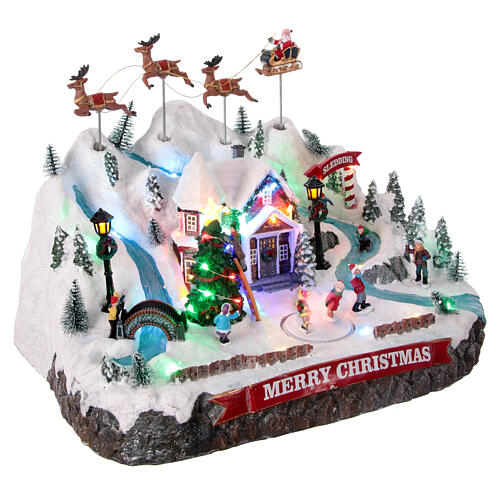 Winterszene, verschneite Berglandschaft mit fliegendem Weihnachtsmann, Bewegung und LED-Beleuchtung – 30×40×30 cm 4
