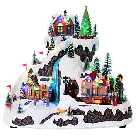 Christmas village on a mountain with train and animated ski slope, 14x16x12 in