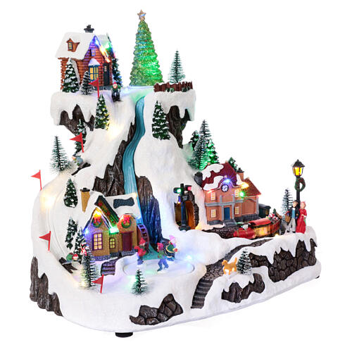 Christmas village on a mountain with train and animated ski slope, 14x16x12 in 5