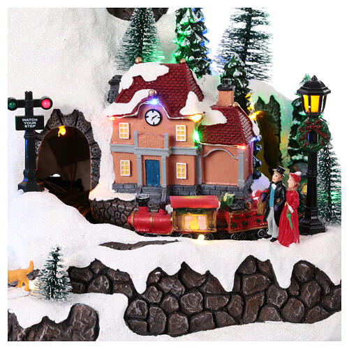 Christmas village on a mountain with train and animated ski slope, 14x16x12 in 6