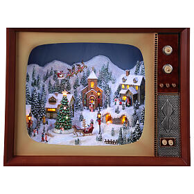 Vintage television with miniature Christmas village in motion, 18x24x10 in