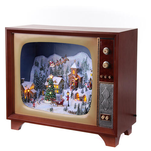 Vintage television with miniature Christmas village in motion, 18x24x10 in 3